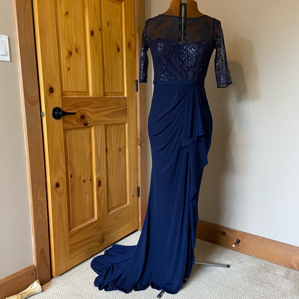 JS Boutique Navy Lace Illusion gown with puddle train
